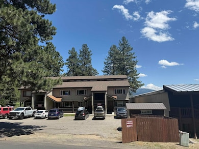 View of front of home featuring uncovered parking