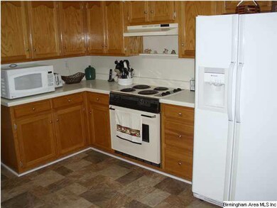 KITCHEN HAS PLENTY OF OAK CABINETS