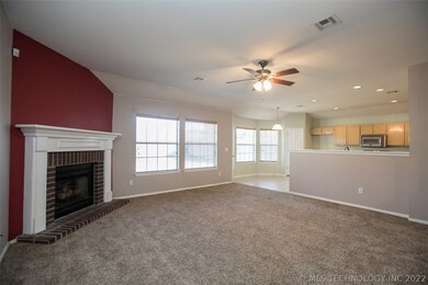 Large Great Room with fireplace and large windows