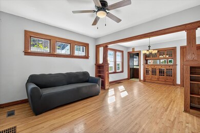 Gorgeous woodwork, built-ins & piano windows grace the main living areas.