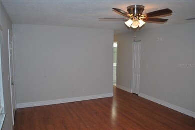 Living room by front windows & front door