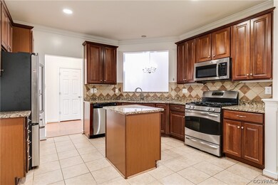 Kitchen featuring stainless steel appliances, ligh