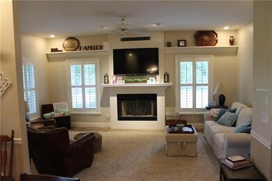 LIVING ROOM WITH WOOD BURNING FIREPLACE