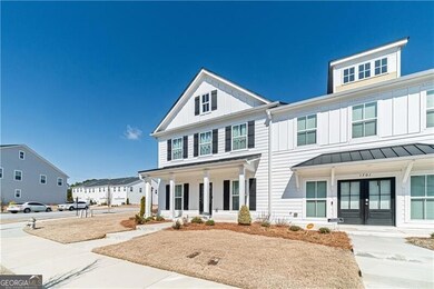 View of front of property with french doors, cover