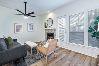Living Room with Fireplace. Door to covered patio,