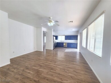 Unfurnished living room featuring dark wood-style