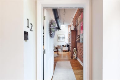 Hall with wood finished floors