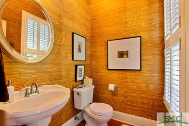 Half bath downstairs off foyer.