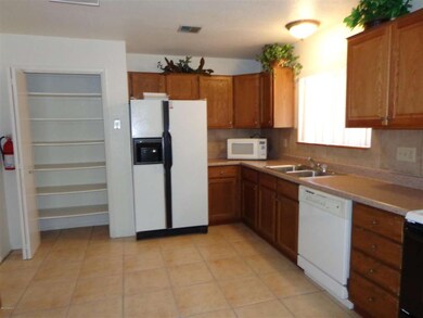 Kitchen includes appliances