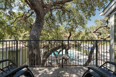 Balcony with view of pool