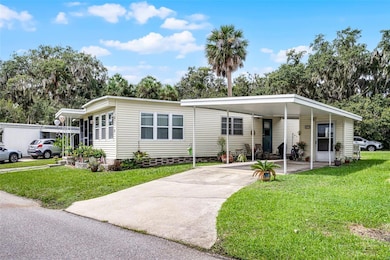 9 Cocos Plumosa Dr unit A, Eustis, FL 32726 - photo 7