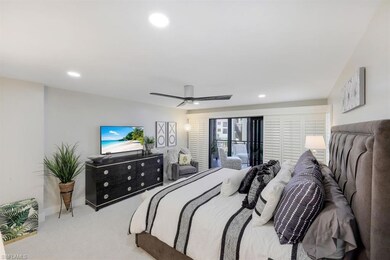 Bedroom with carpet flooring, recessed lighting, and ceiling fan