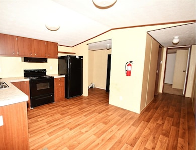 Kitchen with view of utility room