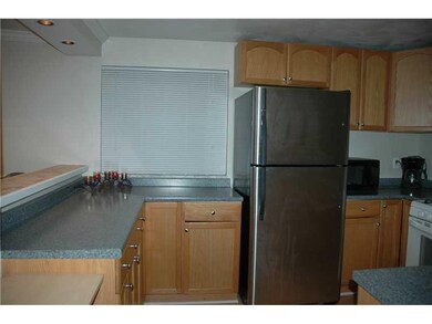 Kitchen. Kitchen opens up to dining room.