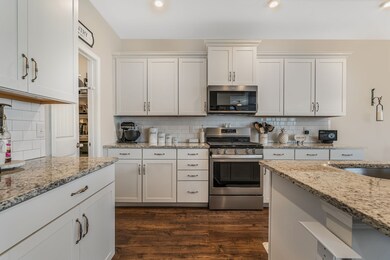 There's no shortage of storage here. There's even a space to the left that makes a perfect coffee bar.