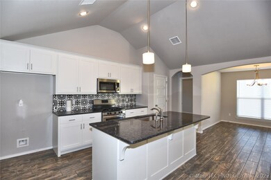 Beautiful kitchen has 2 pantries.