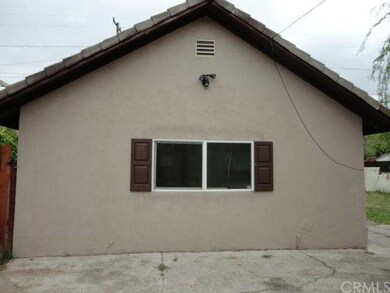 Second home, at end of driveway.