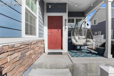 Entrance to property featuring a porch