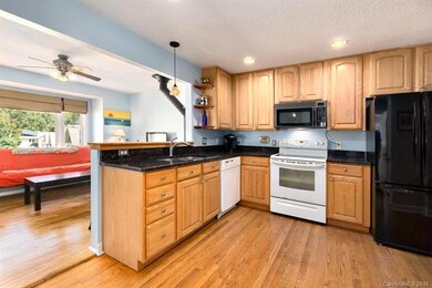Granite Counters - Maple Cabinets