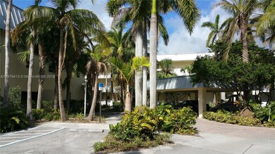 ANOTHER VIEW OF THE PARKING IN FRONT OF THE BUILDING