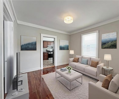 Living room is virtually staged.