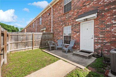 View of yard with a fenced backyard and central AC