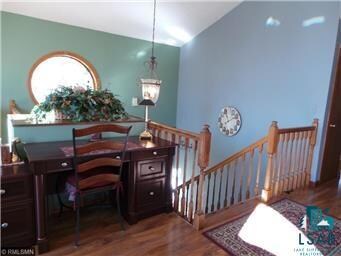 Lower Foyer allows access to the front door, garag
