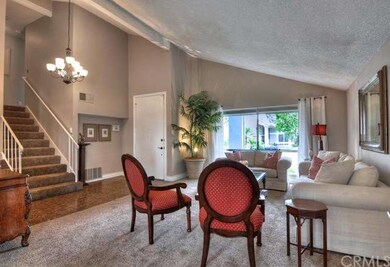 New carpet and updated light fixtures enhance this