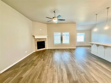 Unfurnished living room with light hardwood / wood