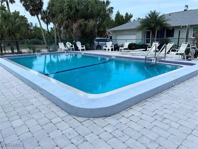 Pool featuring a patio area and fence