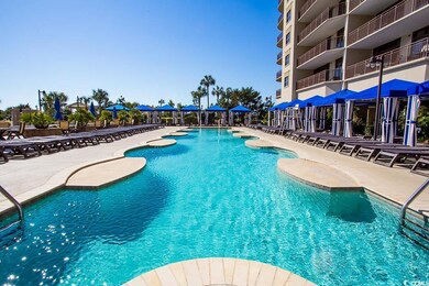 Community pool with a patio area