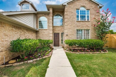 Beautiful mature landscaping, two car garage and plenty of windows make this home special.