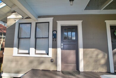 Enter Unit 2 on the left side of the welcoming fro
