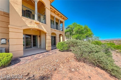 Rear view of property with a balcony and stucco si