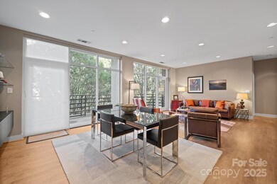Living Area with Private Balcony and Remote Window Coverings