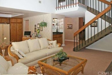 Family Room opens to kitchen and open staircase le