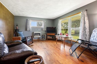 05_11975PuckerStreet_165_LivingRoom_LowR