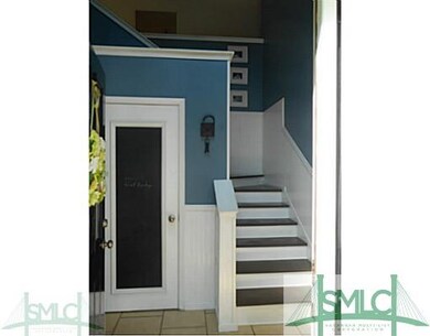 Foyer. Two story foyer opens to downstairs and ups