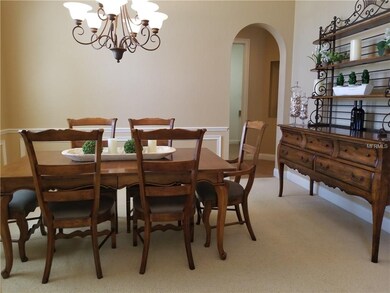 Large Dining room with Arched Windows off Foyer