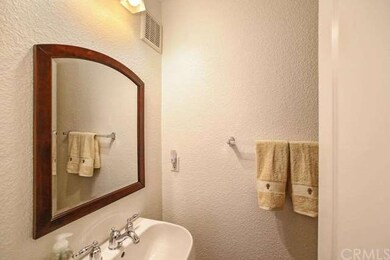 Downstairs powder bathroom with new sink pedestal