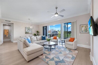 Living room featuring visible vents, baseboards, l