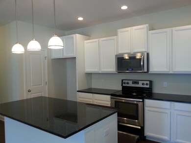 White Kitchen Cabinets and Granite Count