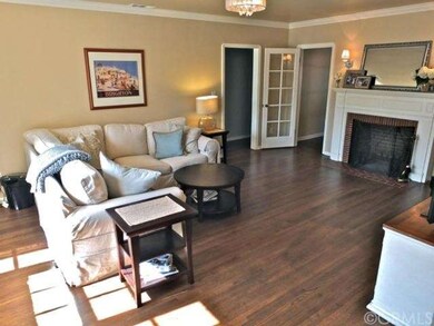 Beautiful warm living room with wood flooring and 