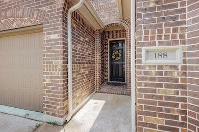 Property entrance with brick siding