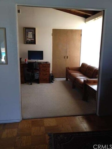 View from Living Room across Natural Wood Parquet 