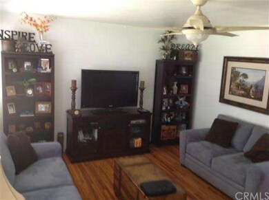 Living room with refinished hardwood floors