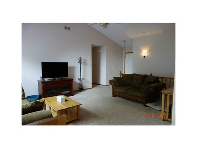 Living Room-L1. View from eat in kitchen to LR