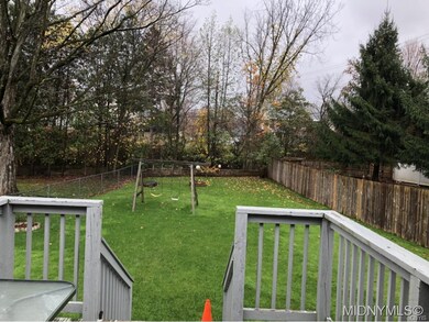 Deep, fenced backyard