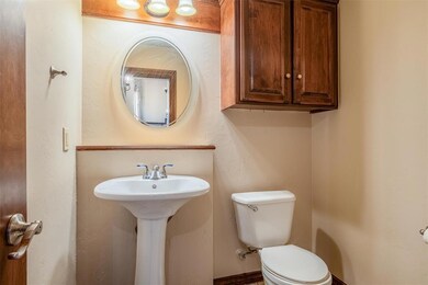 Bathroom with sink and toilet
