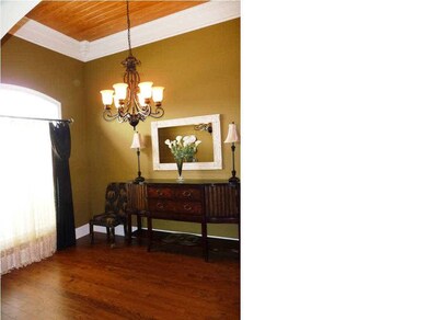 Dining room also with pine ceiling.